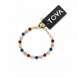 Close-up of the red, white, and blue crystal stones set along the Sarina stretch bracelet