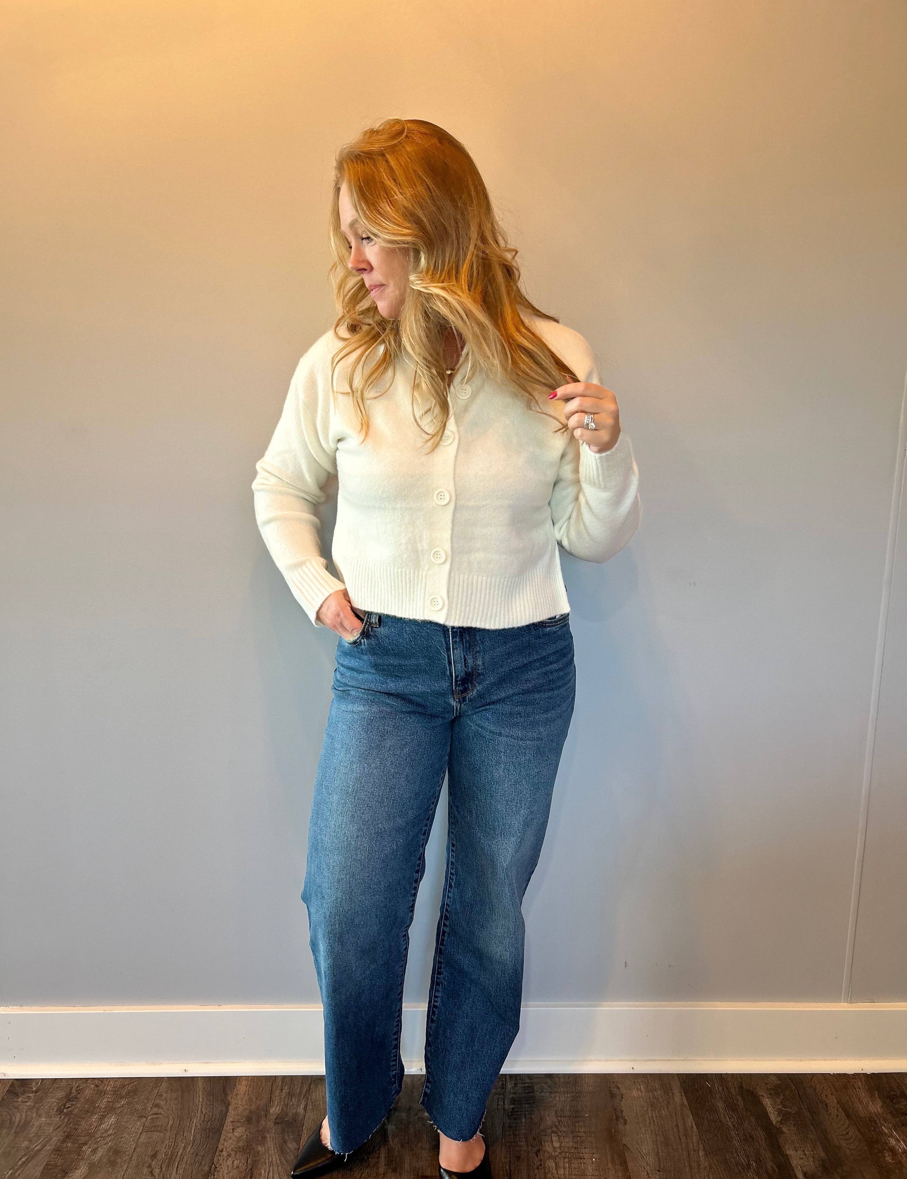 Back view of the straight leg jeans showing the 11 inch high rise waist and straight leg