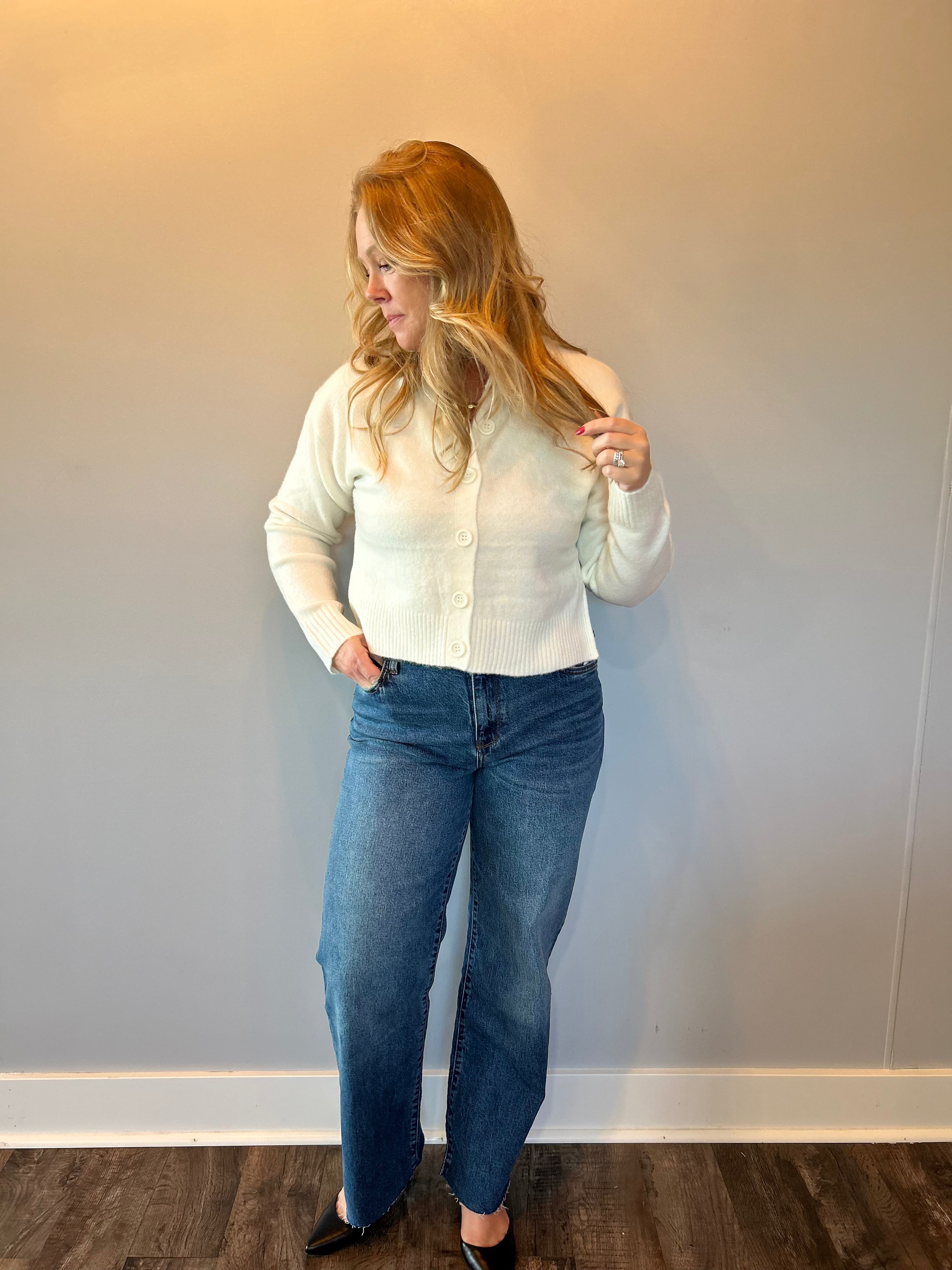 Back view of the straight leg jeans showing the 11 inch high rise waist and straight leg