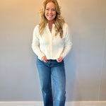 Side view showing the 31 inch inseam and 18 and a half inch leg opening of the jeans