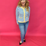 Close-up of the wavy contrast stripe knit texture and neckline on the soft sweater