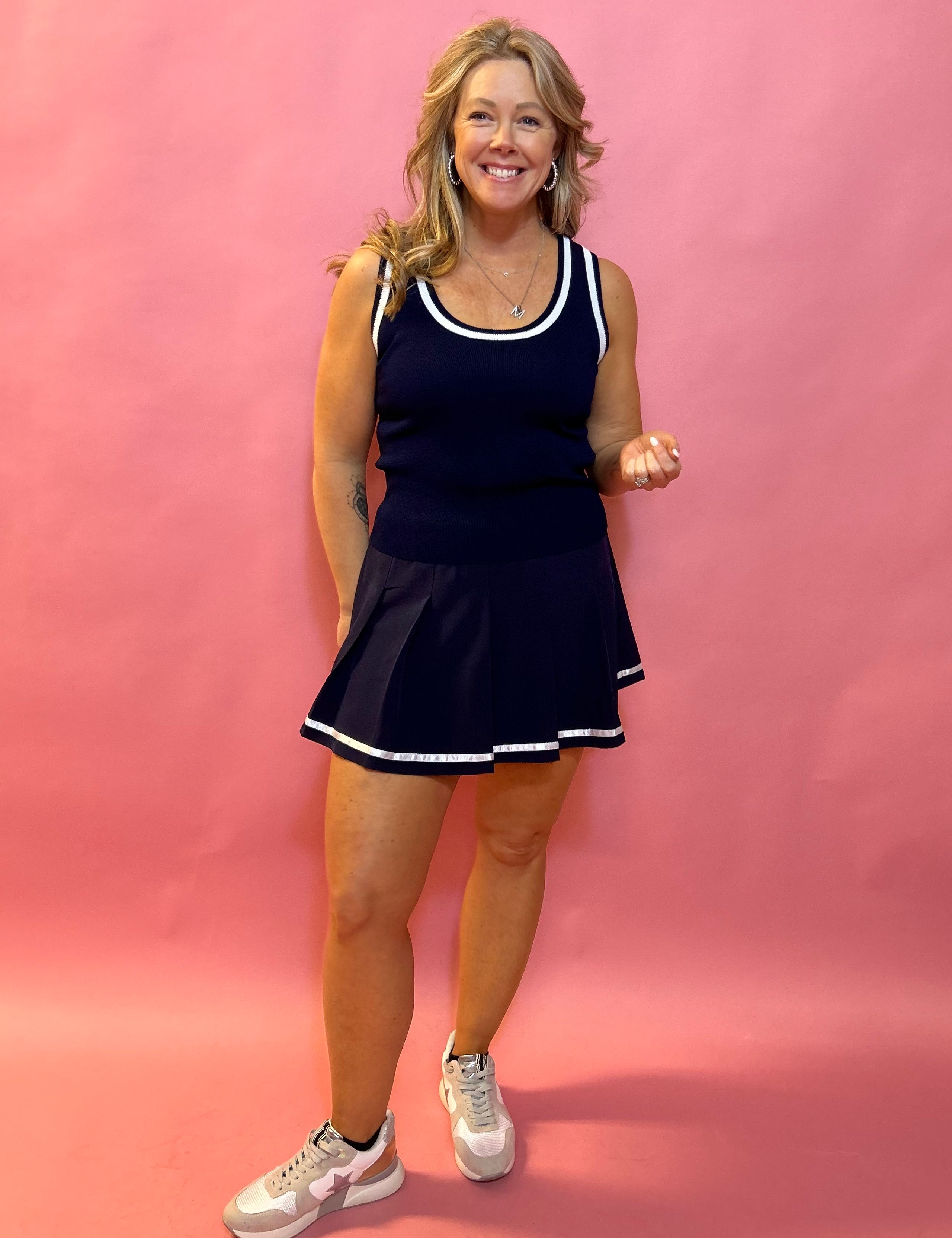 Sporty Elegance: Navy Pleated Skort with White Trim