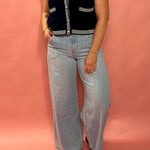 Sporty Elegance: Sleeveless Sweater Vest with Navy Trim