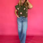 Back view of the cropped olive polka dot sweater top showing the relaxed lightweight knit body