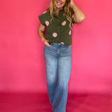 Back view of the cropped olive polka dot sweater top showing the relaxed lightweight knit body