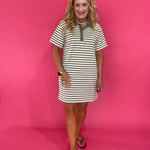 Detail of the side pocket and olive stripe knit on the polo mini dress