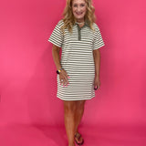 Detail of the side pocket and olive stripe knit on the polo mini dress