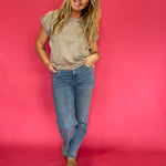 Back view of the mocha scuba top showing the smooth structured knit and straight relaxed hem