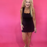 The Crossback Scallop Mini Dress in Black
