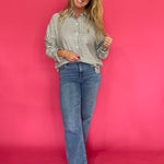 Back view of the emerald plaid shirt showing its relaxed regular fit and shirt hem
