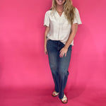 Back view of the oatmeal trapunto stitch blouse showing its easy, body-skimming silhouette