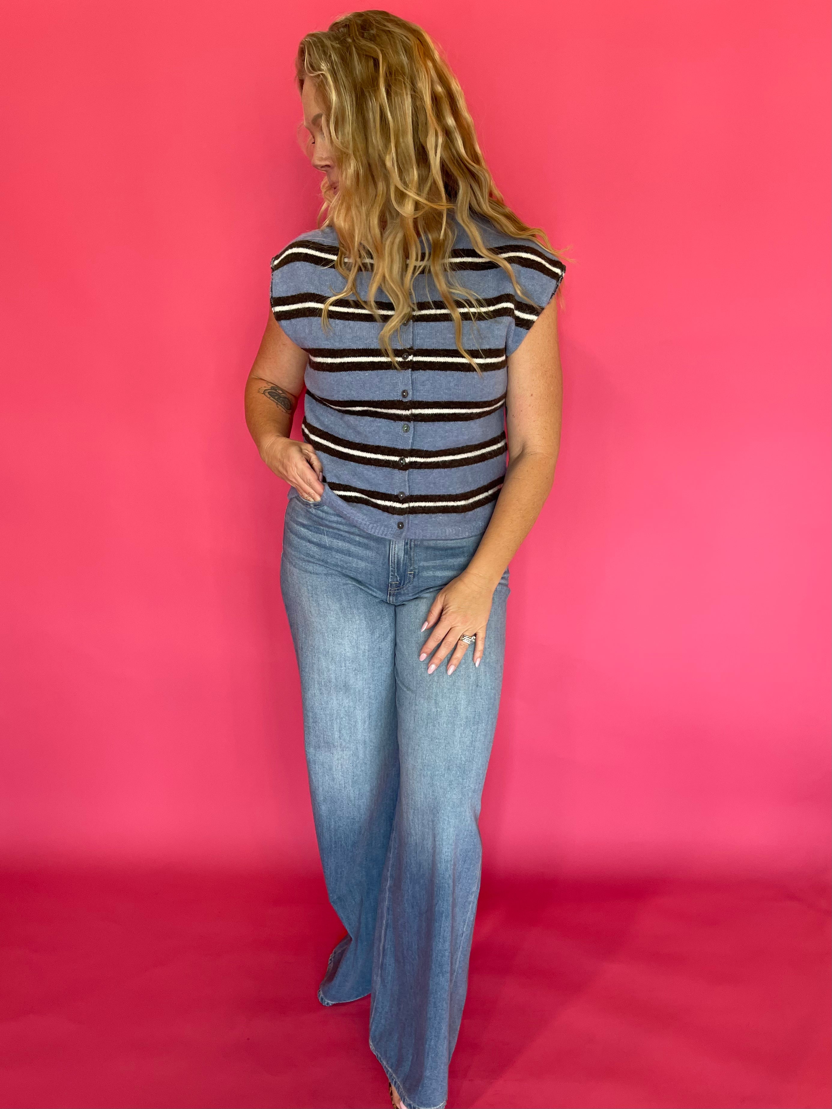Close-up of the crisp blue and white stripe pattern on the lightweight sleeveless top