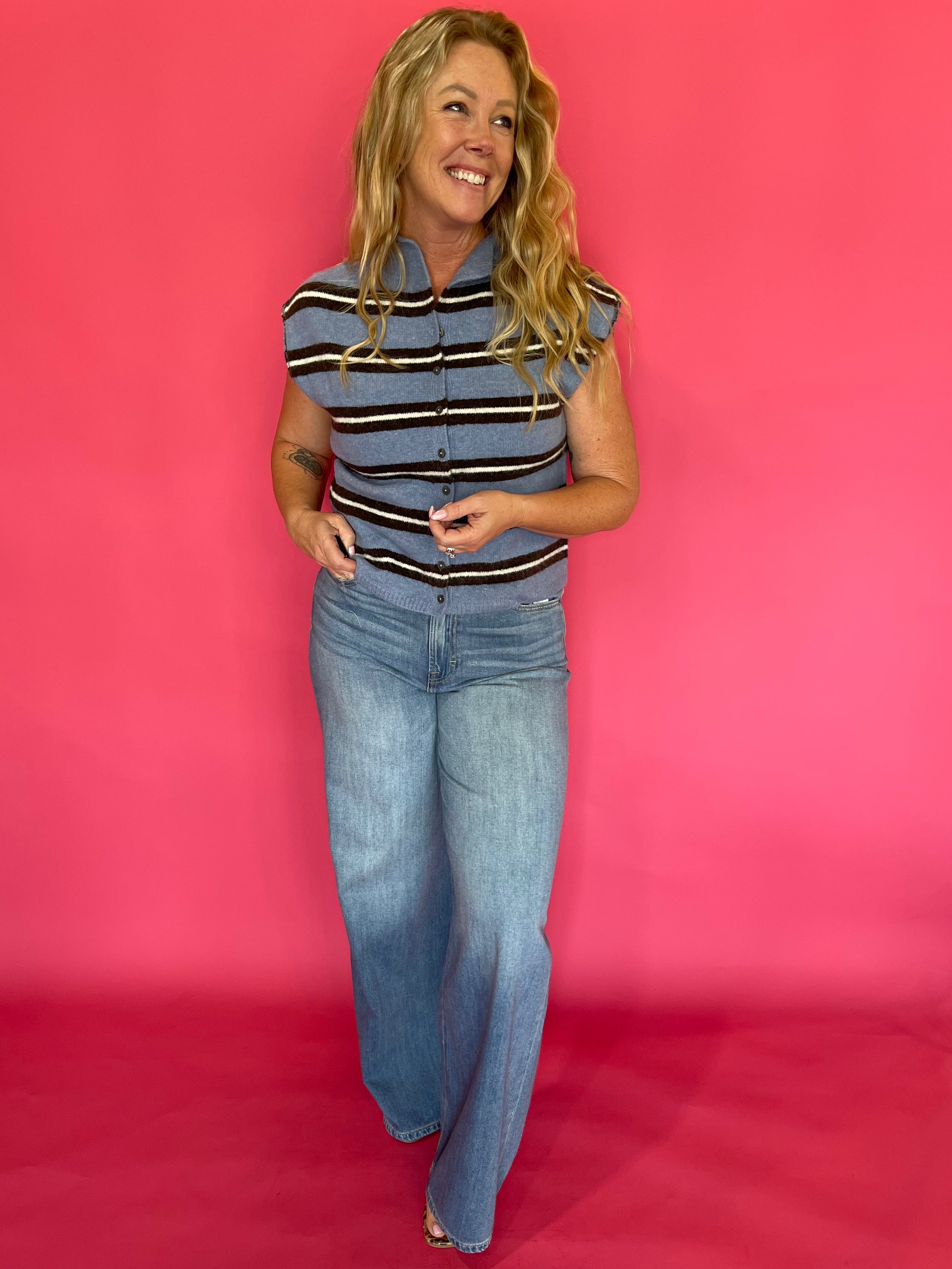 Detail of the neckline and armhole binding on the blue striped everyday sleeveless top