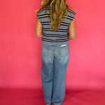 Flat lay of the blue and white striped sleeveless top showing the full stripe pattern