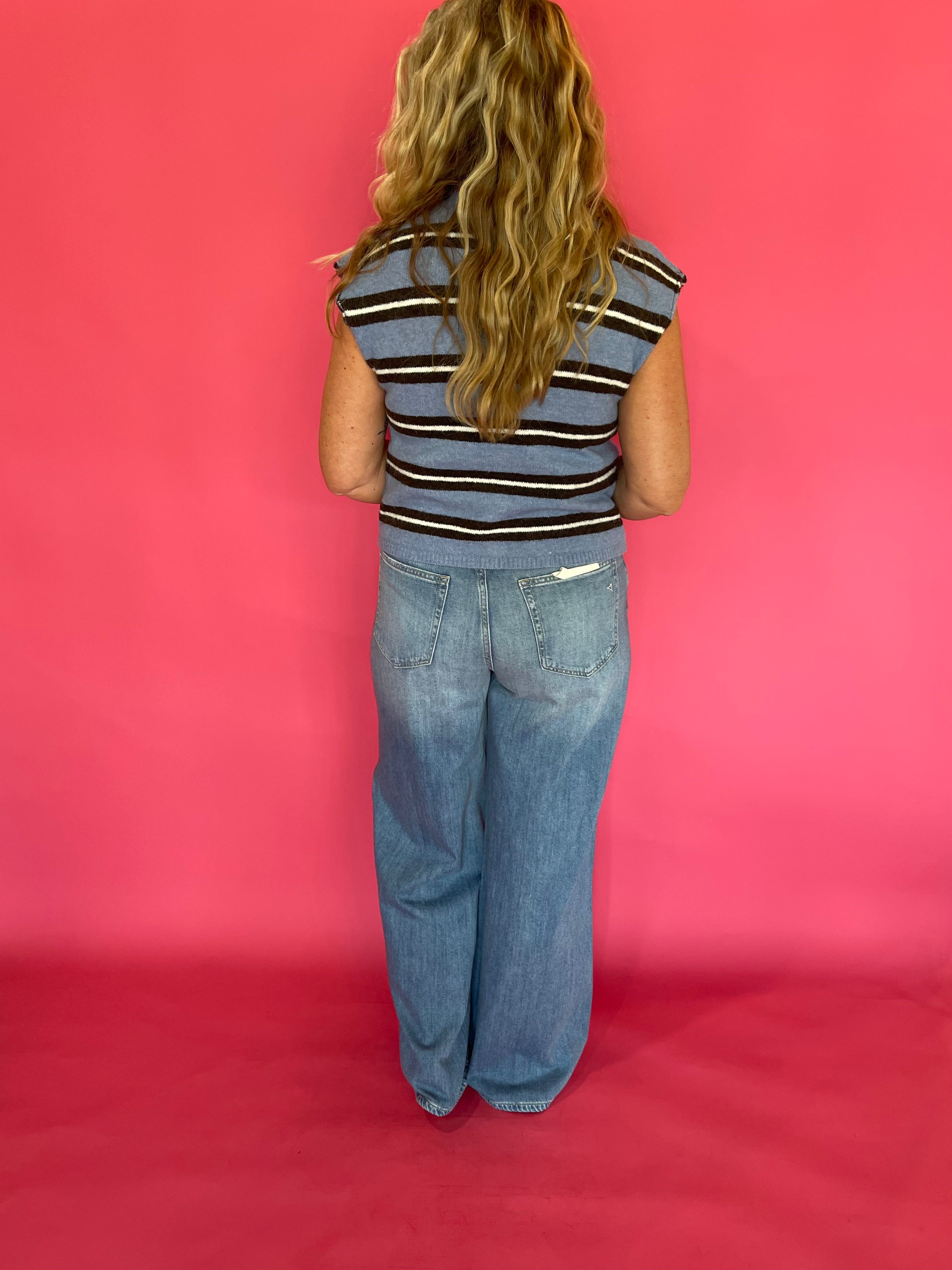 Flat lay of the blue and white striped sleeveless top showing the full stripe pattern