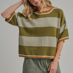 Back view of the blue and brown wide stripe sweater top showing the loose drop shoulder silhouette