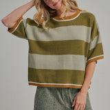 Back view of the blue and brown wide stripe sweater top showing the loose drop shoulder silhouette
