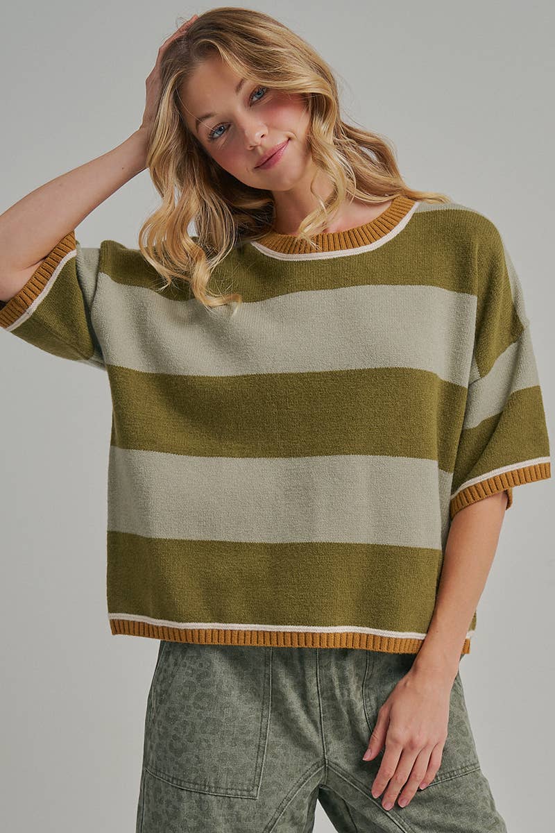 Front view of the blue and brown wide stripe sweater top worn untucked with a relaxed drape