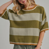 Front view of the blue and brown wide stripe sweater top worn untucked with a relaxed drape